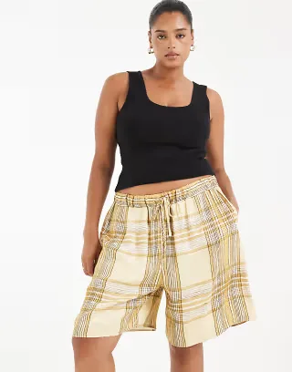 ASOS DESIGN Curve satin city shorts in yellow plaid - part of a set