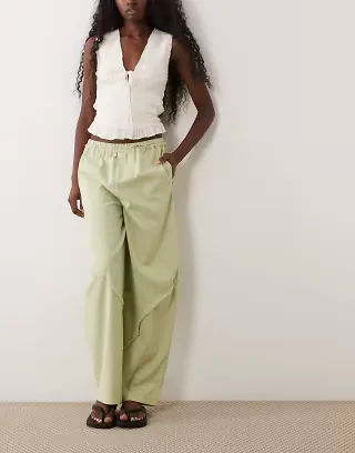 ASOS DESIGN linen blend pull on barrel leg pants with raw seam detailing in sage