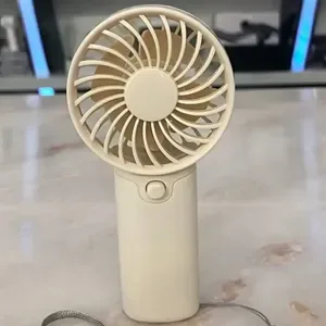 Small Home Appliance 2026 Latest Portable Mini Handheld portable device Fan Lightweight Battery Powered (Aaa) For Office