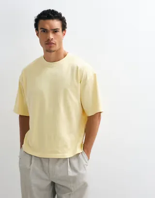 ASOS DESIGN heavyweight oversized boxy T-shirt with pocket in washed yellow