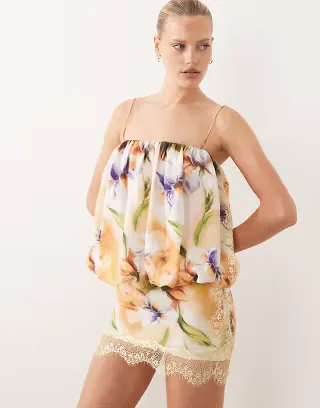 ASOS DESIGN lace applique bubble hem mini dress in blurred floral print