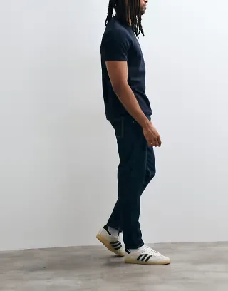 ASOS DESIGN essential stretch tapered jeans in indigo