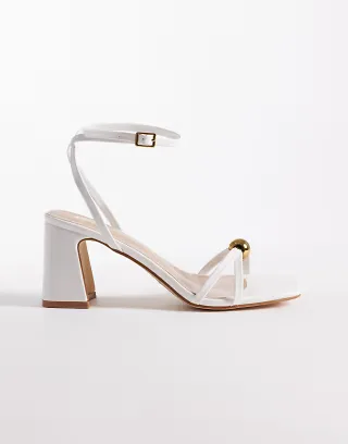 RAID Wide Fit Devena block heeled sandals in gold detail in white