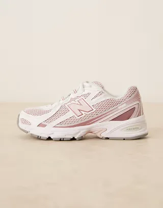 New Balance 740 sneakers in white and pink