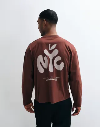 ASOS DESIGN boxy oversized long sleeve t-shirt with city graphic in brown