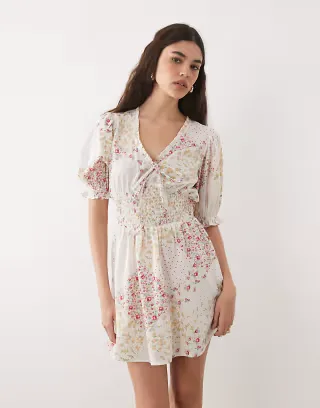 Wednesday's Girl floaty mini dress in beige spliced floral and polka-dot prints
