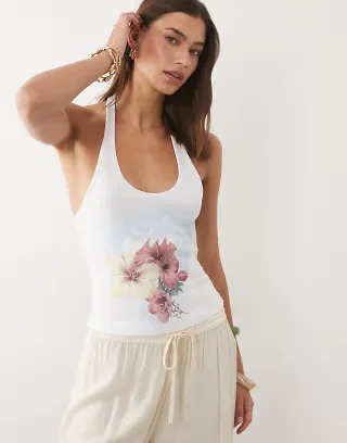 ASOS DESIGN ribbed halterneck tank top with Maui flower graphic in white