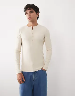 ASOS DESIGN muscle fit long sleeve T-shirt with henley neck in beige