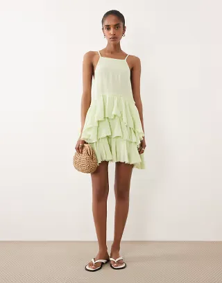 ASOS DESIGN double cloth washed mini sundress with distressed ruffles in washed lime