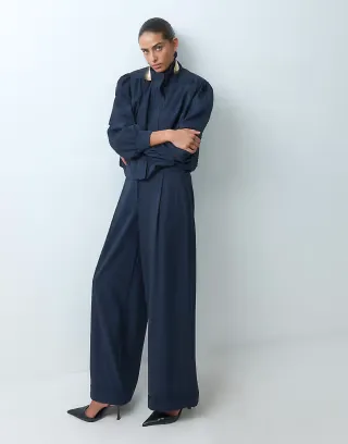 ASOS DESIGN slouchy tailored pants in navy pinstripe