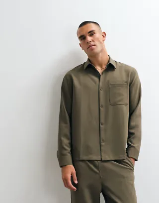 ASOS DESIGN smart relaxed shirt with snaps in khaki