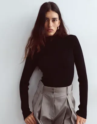 ARRANGE soft knit long sleeve bodysuit in black