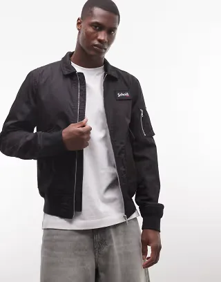 Schott logo patch MA1 bomber jacket with zip pocket detailing in black