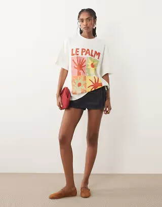 ASOS DESIGN oversized T-shirt with le palm abstract graphic in cream