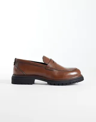 ASOS DESIGN penny loafers with cleated soles in tan leather