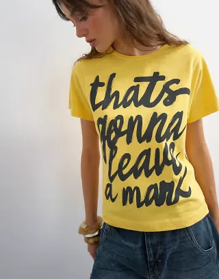 Topshop 'That's Gonna Leave A Mark' graphic tee in yellow