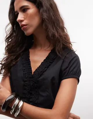 COLLUSION ruffle detail short sleeve blouse in black