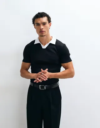 ASOS DESIGN muscle fit polo shirt with contrast collar in black rib knit