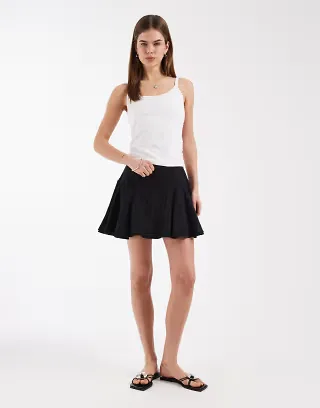 ASOS DESIGN textured drop waist lace insert mini skirt in black
