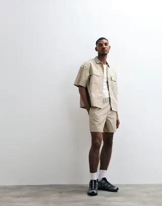ASOS DESIGN cotton twill shorts in mid length in beige - part of a set