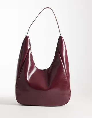 PASQ slouchy shoulder bag in shiny burgundy