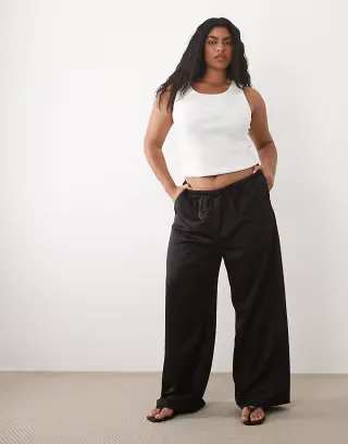 Pretty Lavish Curve Breya satin drawstring pants in black, part of a set