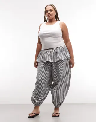 ASOS DESIGN Curve balloon pants with skirt overlay detail in black & white plaid