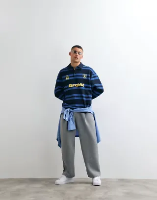 ASOS DESIGN oversized rugby polo stripe sweatshirt with graphic in navy