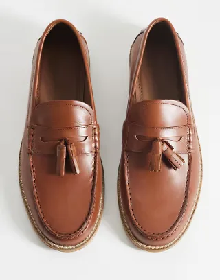 ASOS DESIGN natural sole loafers with tassel trim in tan leather