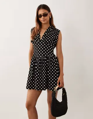 ASOS DESIGN short sleeve cinched-in waist mini dress in black and white polka-dot print