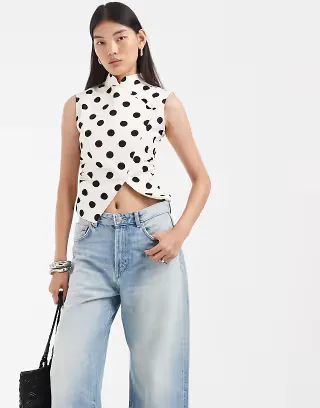 ASOS DESIGN sleeveless mandarin collar shirt in black polka dots