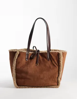 Accessorize reversible shearling tote in cream and tan