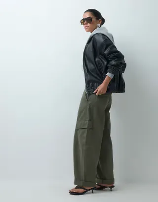 ASOS DESIGN rolled hem cargo pants with pocket detail in washed khaki