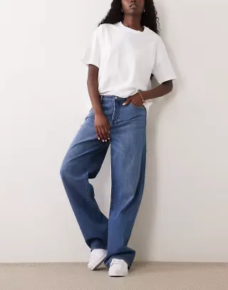 Good American wide leg jeans in vintage wash blue
