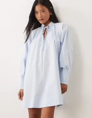 ASOS DESIGN Petite high neck tie poplin mini dress with puff sleeve in soft blue