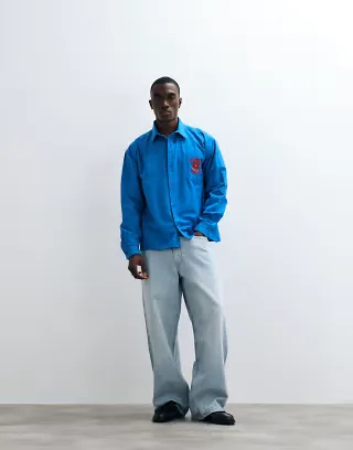 Reclaimed Vintage oversized relaxed shirt with logo in cobalt blue