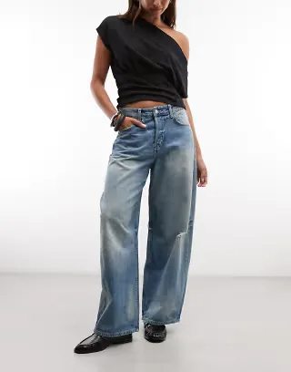 Weekday low waist baggy wide leg jeans with distressed details in faded blue wash