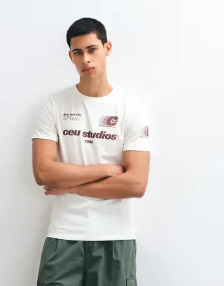 ASOS DESIGN slim t-shirt with football graphic in cream