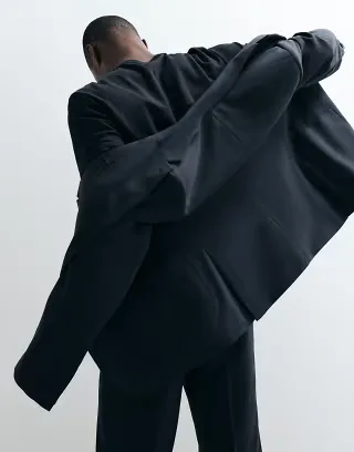 ASOS DESIGN FlexMax™ slim suit jacket in black
