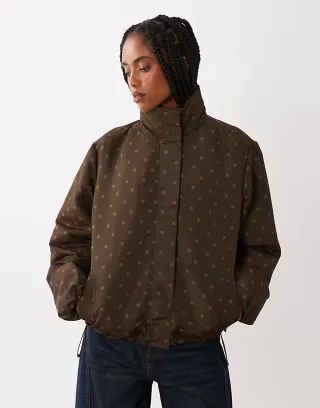 Threadbare funnel neck rain jacket with elastic hem in brown polka dot print
