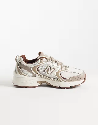 New Balance 530 sneakers in white and brown