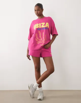 Kaiia cotton rich Ibiza graphic oversized t-shirt and sweatshirt fabric shorts set in hot pink and orange