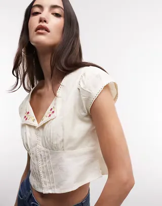 Reclaimed Vintage cropped shirt with collar and floral embroidery in cream