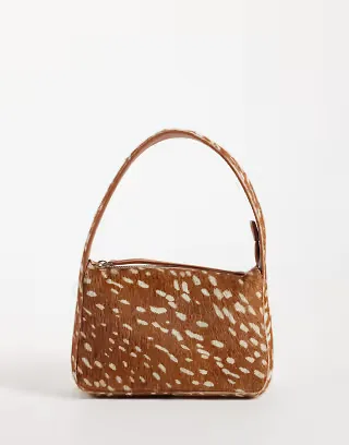 ASOS DESIGN hair on leather grab bag in deer print