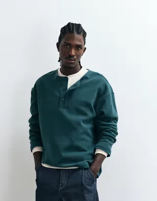 ASOS DESIGN boxy oversized t-shirt with henley neck in dark green