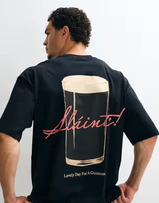 ASOS DESIGN oversized t-shirt with Guinness print in black