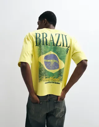 ASOS DESIGN boxy oversized tee with FIFA World cup Brazil print in Yellow