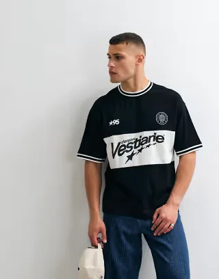 ASOS DESIGN oversized cut and sew t-shirt with blocked soccer graphic in black