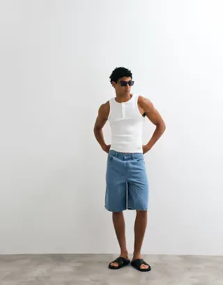 ASOS DESIGN loose textured denim jorts in mid wash blue