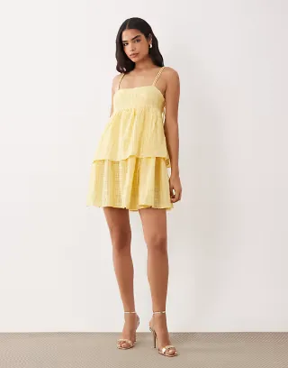 VILA tiered gingham textured mini dress in pastel yellow